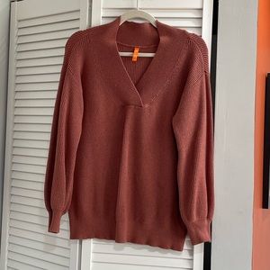 orange v-neck sweater